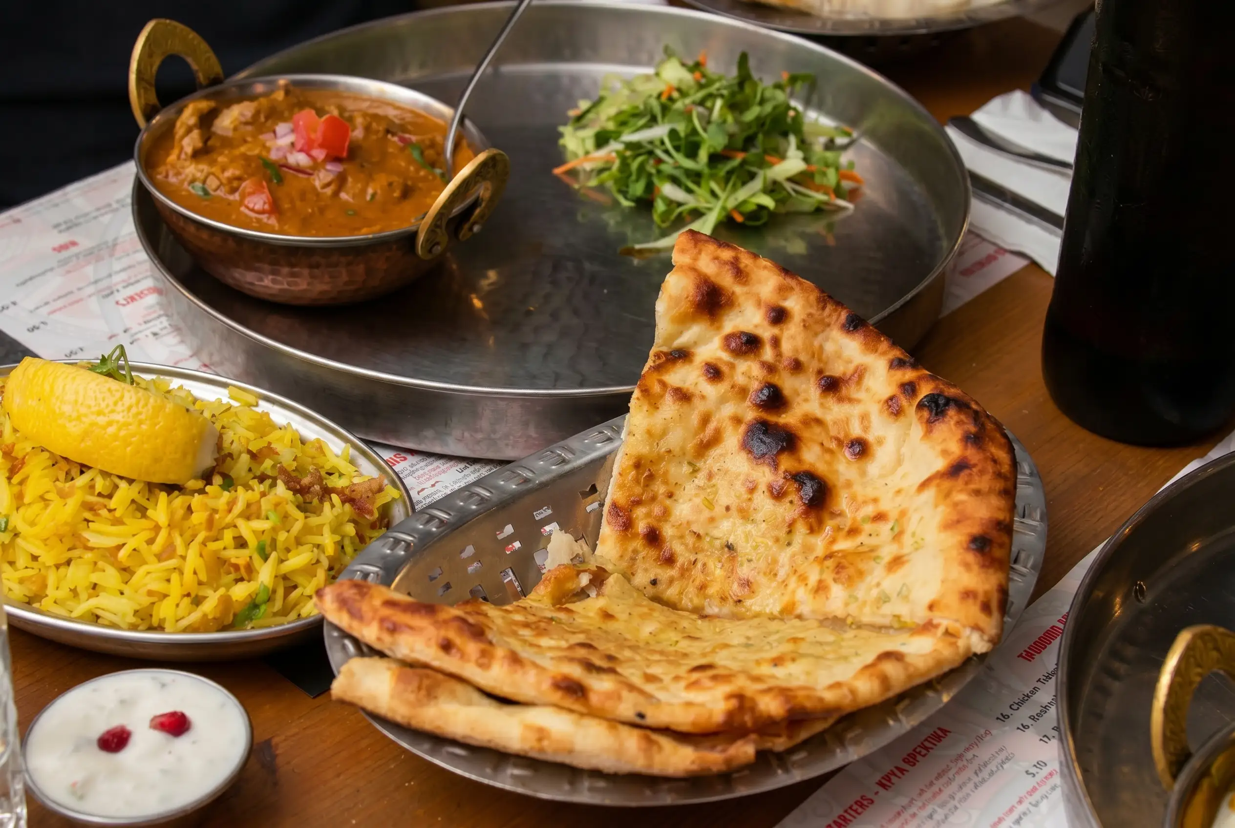 Biryani and thali spread on the table